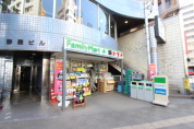 ファミリーマート薬ヒグチ日暮里店